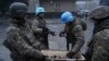 Trupat kazake “keqpërdorin” helmetat e OKB-së