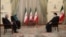 ابراهیم رئیسی (راست)