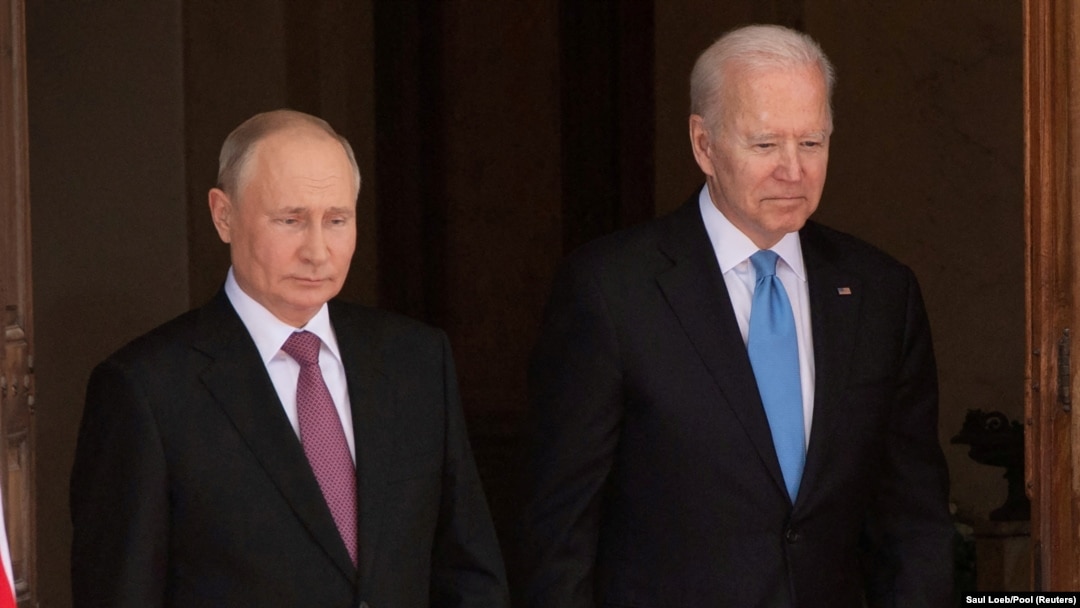 U.S. President Joe Biden (right) and Russian President Vladimir Putin arrive for a summit in Geneva on June 16, 2021.