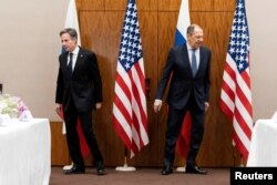 Secretarul de stat american Antony Blinken și ministrul rus de externe Serghei Lavrov, la Geneva, Elveția, 21 ianuarie 2022.