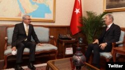Turkey - Turkish Defense Minister Hulusi Akar (right) meets Ambassador Serdar Kılıç to discuss normalization talks with Armenia, January 10, 2022.
