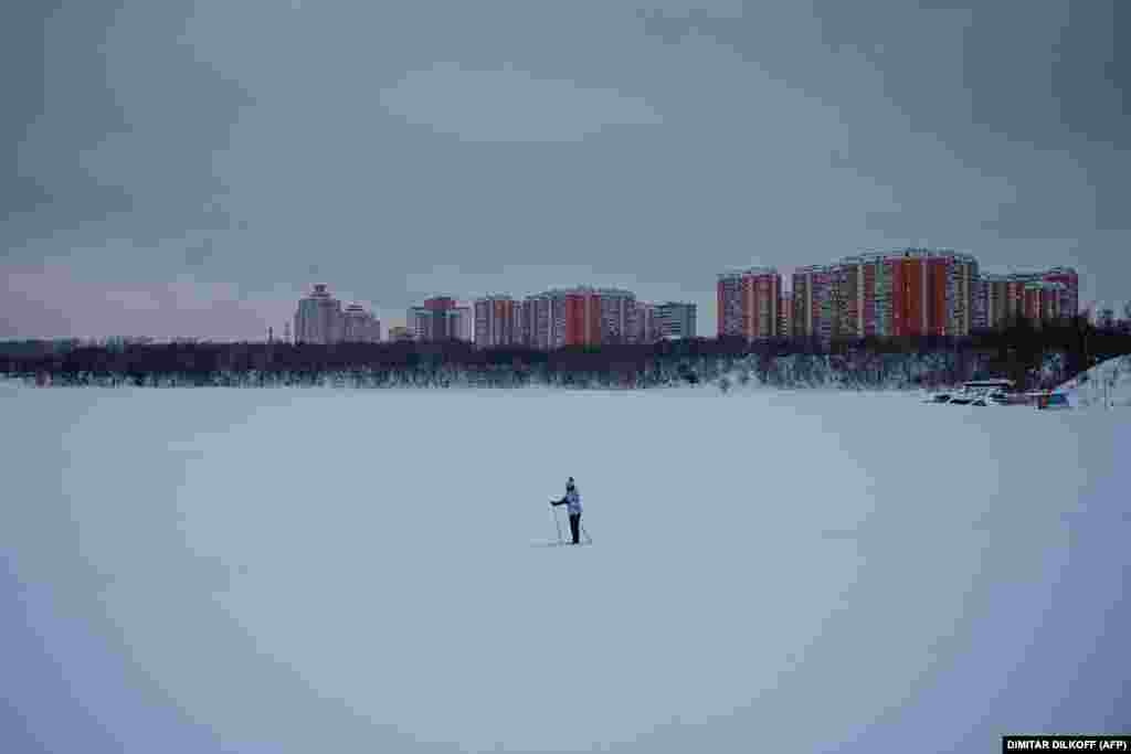 A skier moves through a snow-covered field in Moscow.&nbsp;