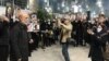 Families of the crash victims gather at Tehran's airport on the second anniversary of the disaster on January 8.