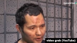 Скриншот из видео с «признанием» Викрама Рузахунова