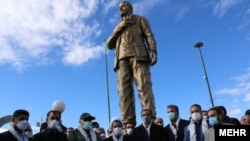 A statue of Iranian Major General Qassem Soleimani in Shahrekord, Iran, which was unveiled earlier this week, but then set alight hours later. 