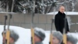 Russia -- Russia's President Vladimir Putin attends a flower-laying ceremony at the Motherland monument at the Piskaryovskoye Memorial Cemetery