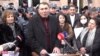 Armenia - Aharon Khachatrian is sworn in as mayor of Vartenis outside the municipal administration building cordoned off by police, January 4, 2022.