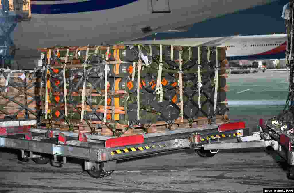 A pallet of military supplies arrives at Kyiv&#39;s Boryspil Airport on January 25. Hundreds of tons of ammunition and weapons have been flown to Ukraine from the United States.&nbsp;