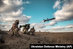 Ukrainian soldiers use a U.S. Javelin anti-tank missile during military exercises in the Donetsk region on December 23.