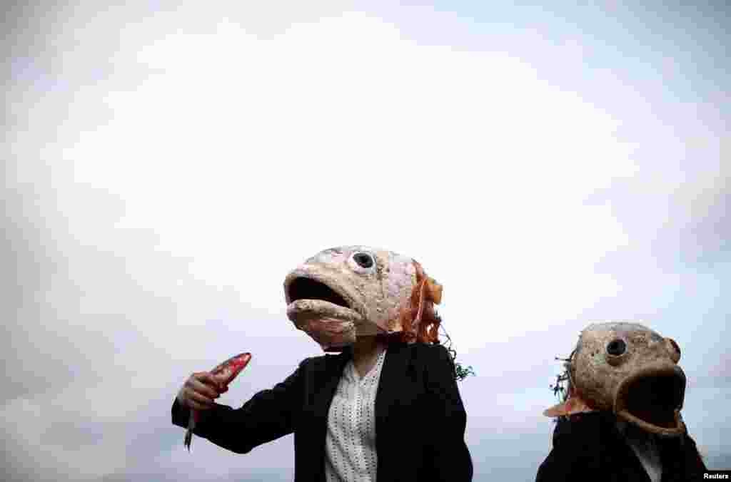 Ocean Rebellion activists protest against destructive industrial fishing during the UN Climate Change Conference (COP26), in Glasgow, Scotland, Britain, November 4, 2021