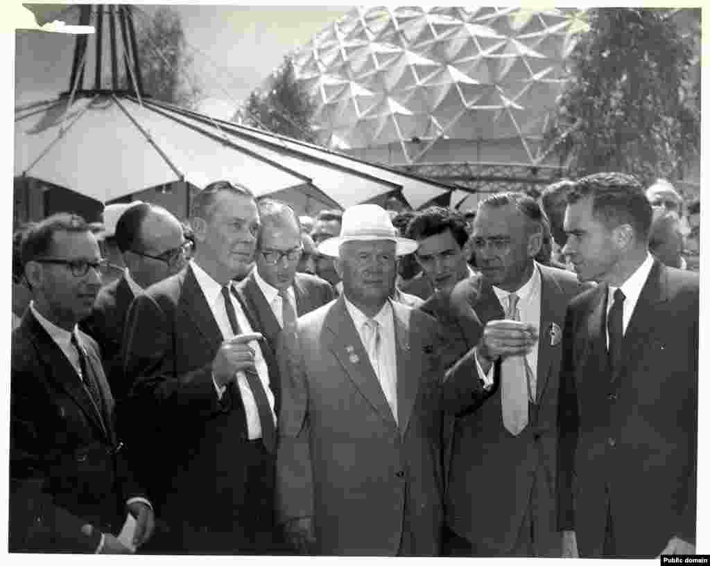 The American exhibit was opened by then-Vice President Richard Nixon (right) and Soviet leader Nikita Khrushchev (in white hat). Their impromptu debates over the merits of capitalism versus communism as they strolled through the exhibition would become legendary. &nbsp;