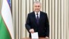 Uzbek President Shavkat Mirziyoev casts his ballot in a constitutional referendum in Tashkent on April 30. 