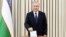 Uzbek President Shavkat Mirziyoev casts his ballot in a constitutional referendum in Tashkent on April 30. 