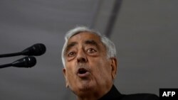Chief Minister of the Indian state of Jammu and Kashmir Mufti Mohammad Sayeed speaks during a ceremony to mark the 83rd anniversary of Martyr's Day at the Mazar-e-Shohda, or 'Martyr's Graveyard', in Srinagar, July 2015.