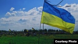 Кладбище в украинском городе Буча, где захоронены сотни граждан Украины - жертв войны 