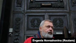Novaya gazeta Editor in Chief Dmitry Muratov leaves the Supreme Court building in Moscow on September 15.