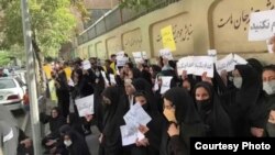 Relatives of people sentenced to death in Iran protest outside the country's judiciary headquarters earlier this week.