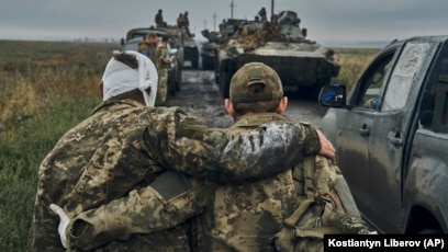 Video shows Ukrainian council member throw grenades at village meeting;  dozens injured