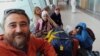 Раушан Валиуллин с семьей в аэропорту