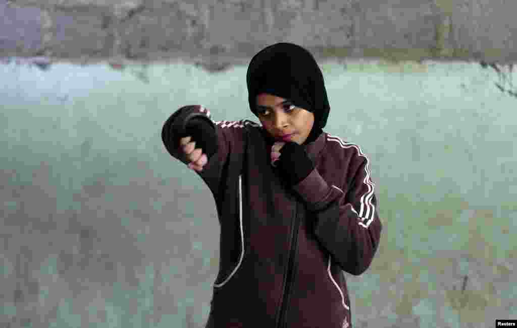 Misbah, 17, takes part in warm up exercises at the first women&#39;s boxing camp in Karachi, Pakistan, February 19, 2016.&nbsp;The opening of the school angered many in Pakistan who say that women have no place in sport.