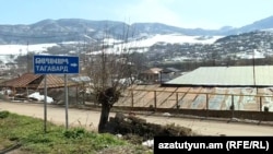 Nagorno Karabakh - A road sign outside the village of Taghavard, March 30, 2022.