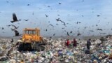 Bishkek - Kyrgyzstan - garbage - garbage truck - garbage landfill - garbage truck - garbage collection equipment - 01.04.2022 - bulldozer
