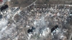 Imagine din satelit care arată distrugerile din Mariupol.