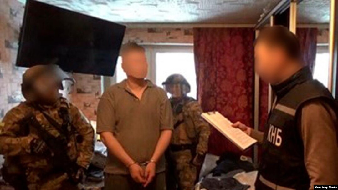 A photo on the KNB's website purports to show the arrest of the "foreign intelligence agent."