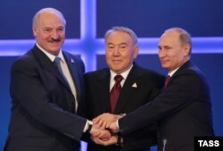 ЕАЭО келісіміне қол қойған Беларусь, Қазақстан, Ресей президенттері. Астана, 29 мамыр 2014 жыл.