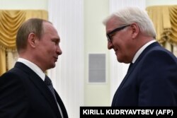 Russian President Vladimir Putin (left) meets with German Foreign Minister Frank-Walter Steinmeier at the Kremlin in March.