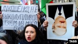People protest increased costs for community services and new taxes in Minsk on March 15.