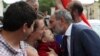 NAGORNO-KARABAKH -- Armenia's Prime Minister Nikol Pashinian kisses a baby after a news conference in Stepanakert, May 9, 2018. Nagorno-Karabakh