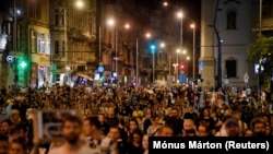 Protesters march to Elisabeth Bridge in Budapest on July 13.