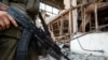 Военнослужащий группировки «ДНР» на на территории Углегорской ТЭС, поврежденной в результате обстрелов, 25 июля 2022 года