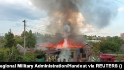 Пожар в жилом доме после российского ракетного удара, Бахмут, 28 июля 2022 г.