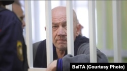 Mikalay Autukhovich attends a court session in Hrodna in July.
