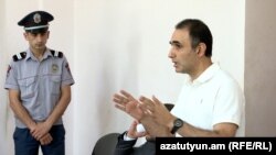 Armenia - Opposition figure Avetik Chalabian speaks at the start of his trial, Yerevan, July 26, 2022.