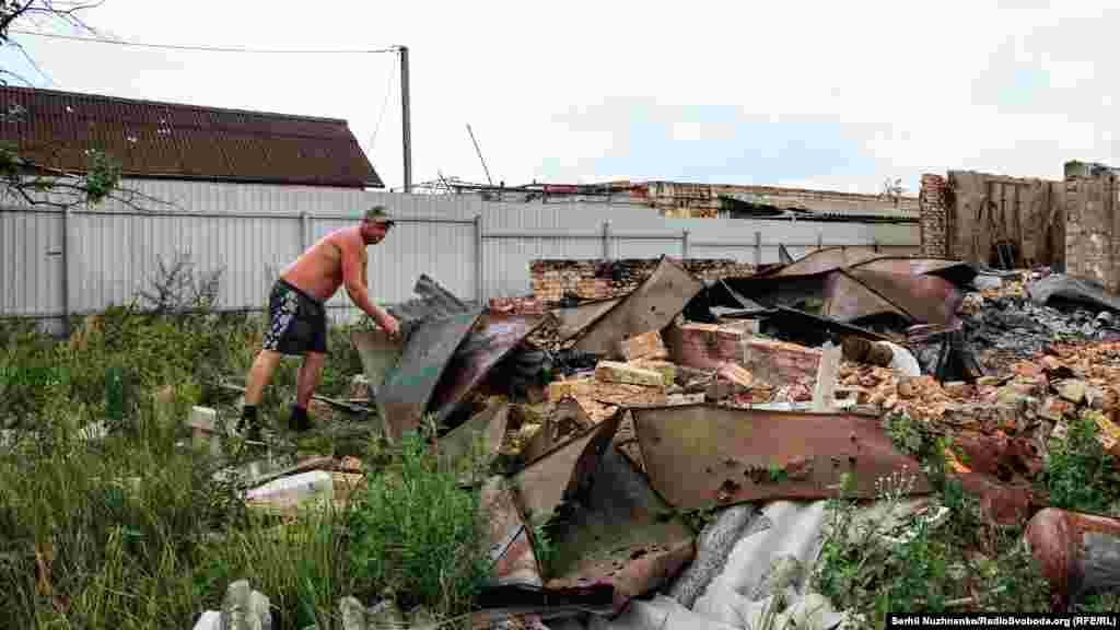 The liberation of Moshchun occurred on March 21. While many of its inhabitants were killed or have left, some, like Yaroslav -- pictured here rummaging among the wreckage of his destroyed home -- have chosen to stay.