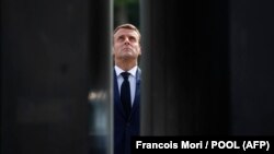 Emmanuel Macron la parada din Paris de Ziua Bastiliei, 14 iulie. 