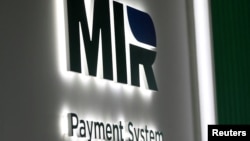Moscow has vowed to expand its Mir payments system in so-called "friendly countries" as Western sanctions attempt to shut it out of international finance over its war against Ukraine.