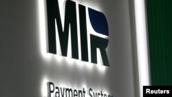 Russia - The logo of MIR payment system is on display at the St. Petersburg International Economic Forum (SPIEF) in Saint Petersburg, June 2, 2021.