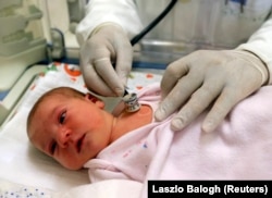 A newborn baby at a hospital in Gyula, a town in eastern Hungary.