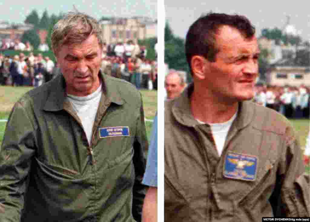 The pilots, Yuriy Yegorov (left) and Volodymyr Toponar, are seen moments after they ejected from their plane. They sustained only minor injuries.