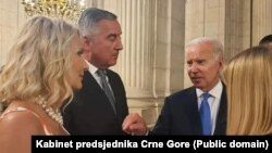 Predsjednici Crne Gore i SAD, Milo Đukanović i Joe Biden na marginama NATO samita u Madridu, jun 2022.