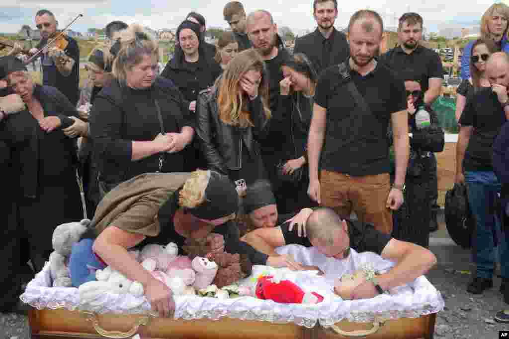 Relatives and friends attend the funeral ceremony for Liza, 4-year-old girl killed by a Russian attack in Vinnytsya, Ukraine, on July 17.