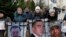 Relatives of Ukrainian prisoners held by the Russia-backed separatists display pictures of their loved in Kyiv in January. 