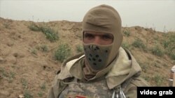 "Yslam döwleti" atly söweiji toparyň bir agzasy.