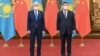 Президент Казахстана Касым-Жомарт Токаев (слева) и китайский лидер Си Цзиньпин в Пекине, 5 февраля 2022 года