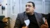 Депутат Кузьміних прийшов до суду з обрання йому запобіжного заходу, але засідання перенесли на 11 лютого