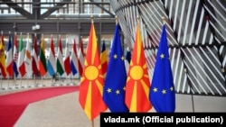 Macedonian and EU flags in Brussels